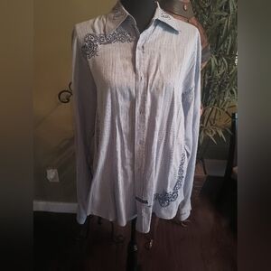 Men's light blue embroidered button-down dress shirt.